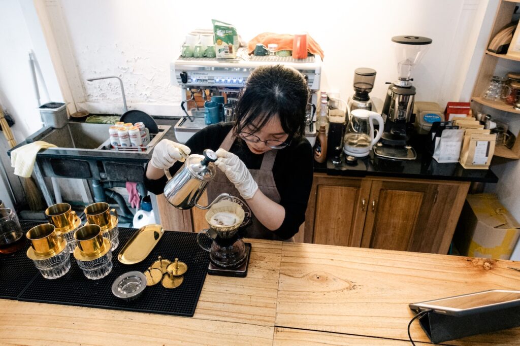 Barista making drip coffee in Vietnam 