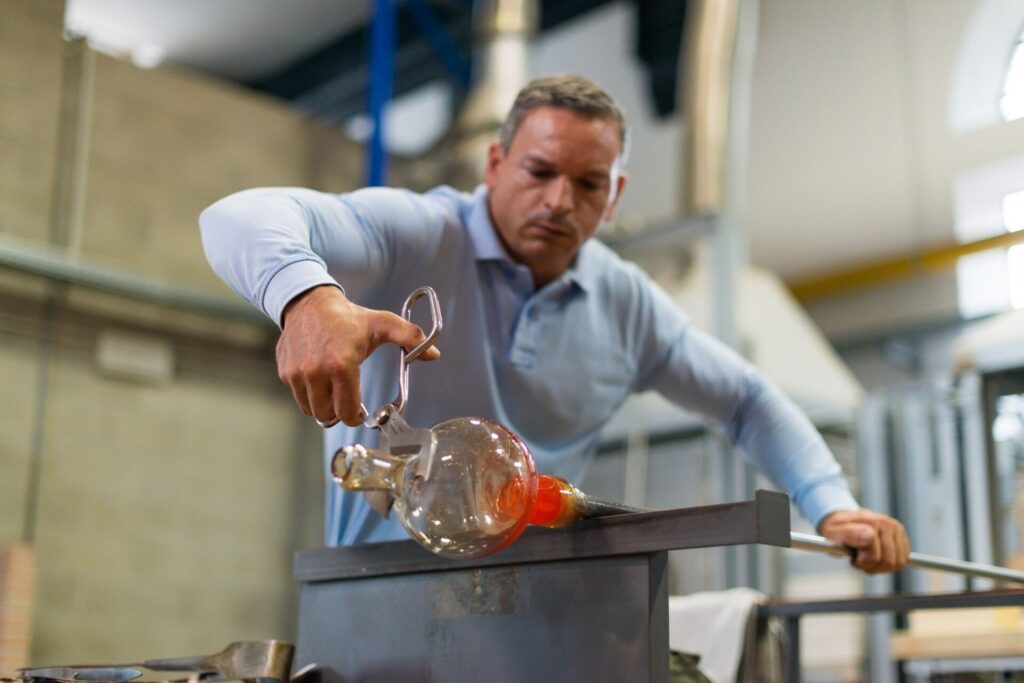 glassblower demonstrating his skills in Murano, Venice