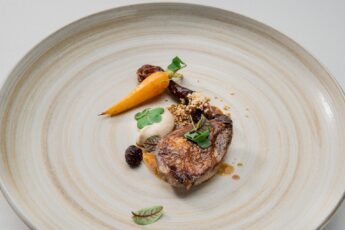 Fine dining plate of meat and carrot