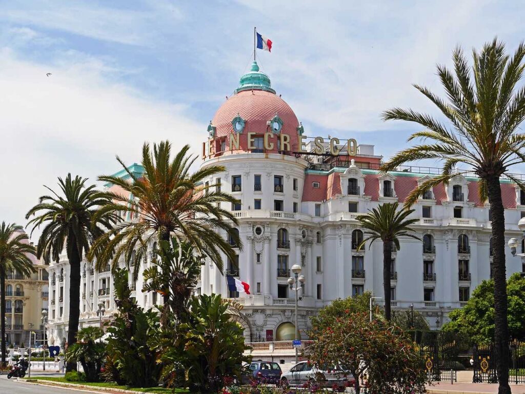 Le Negresco hotel with palm trees in foreground 