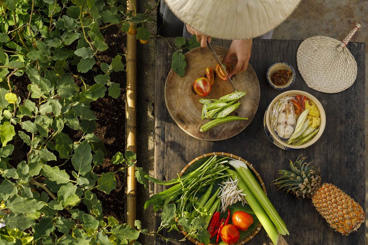 Birdseye view of Vietnamese cook preparing vegetables 