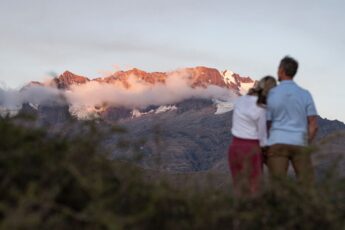 couple overlooking sacred valley peru