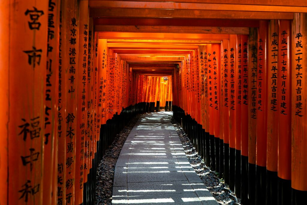 Tunnel of red Torii gates in Japan