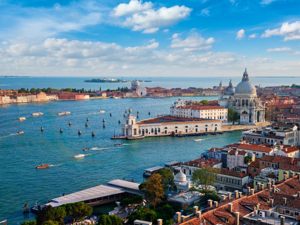 Buildings, landmarks, and ships on the coast of Venice, Italy