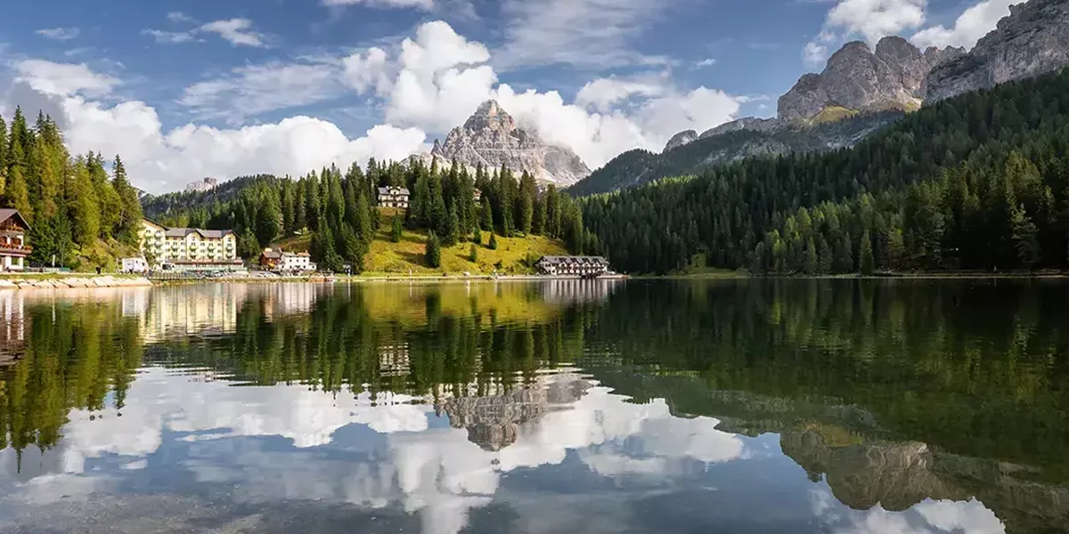 Mountains reflecting in Lake Misurina, Dolomites, Belluno, Italy