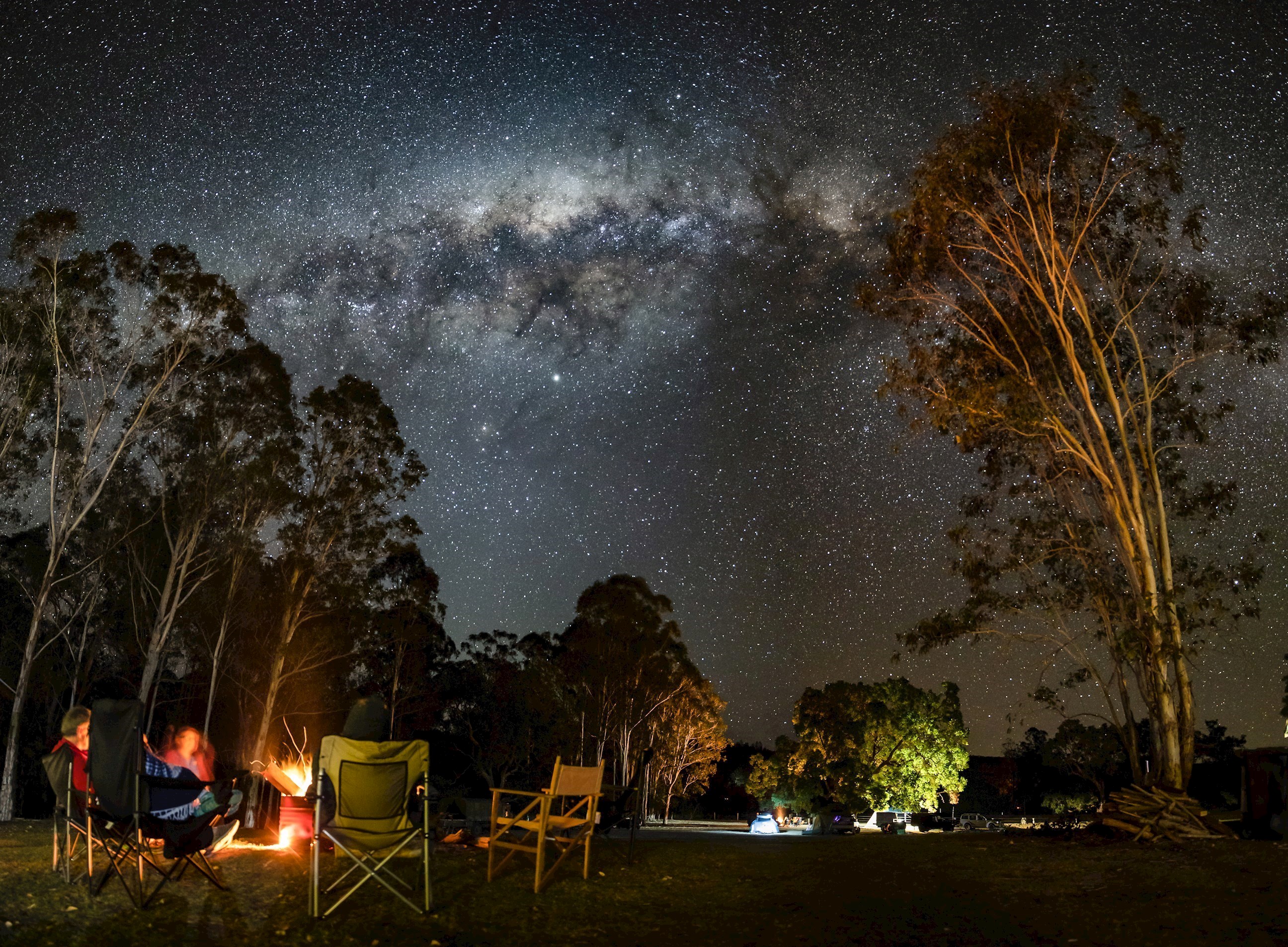 Campers having dinner under the stars in Campfire Alice Springs, Australia