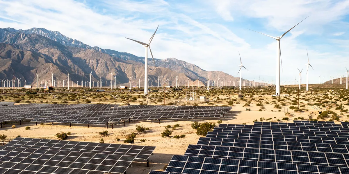 Large Aerial View Over Solar Panels And Windmills 1367402534