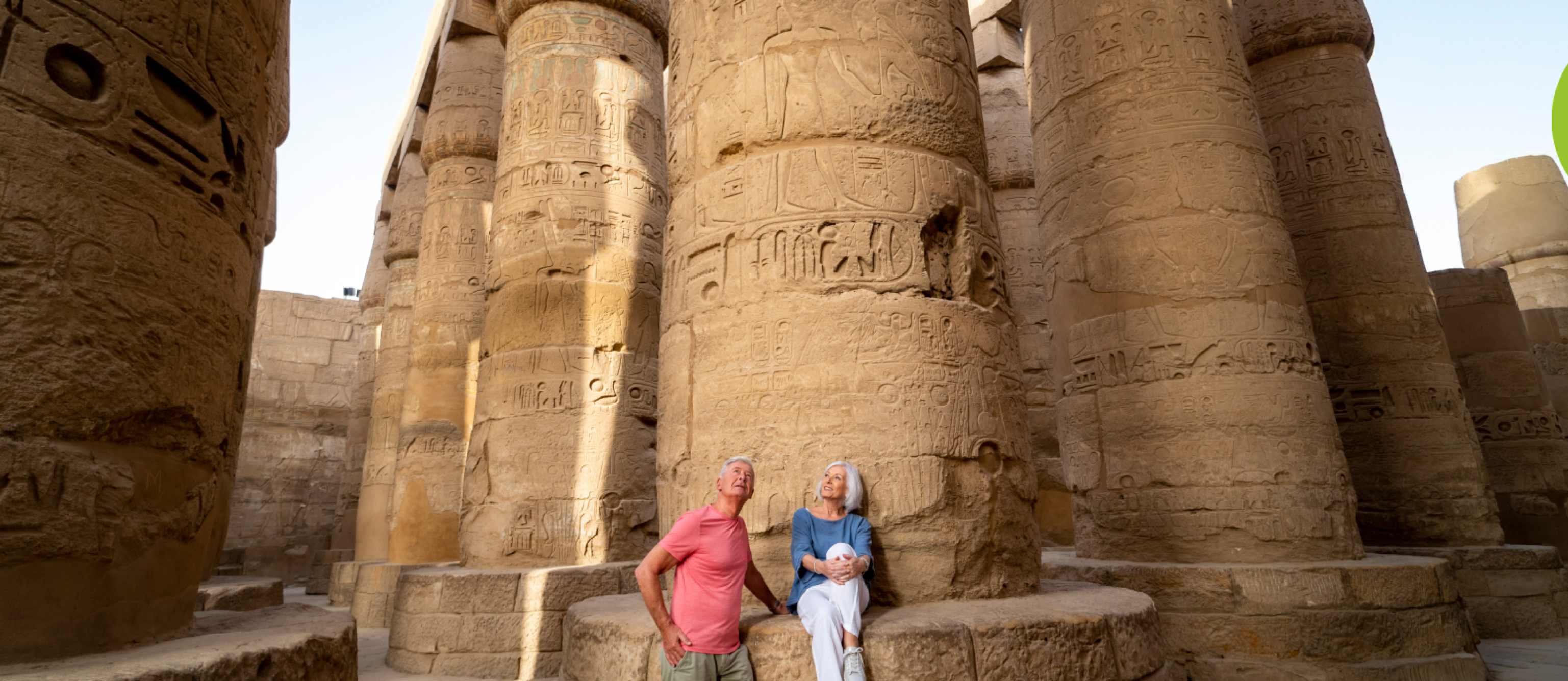 A couple visiting ancient ruins.