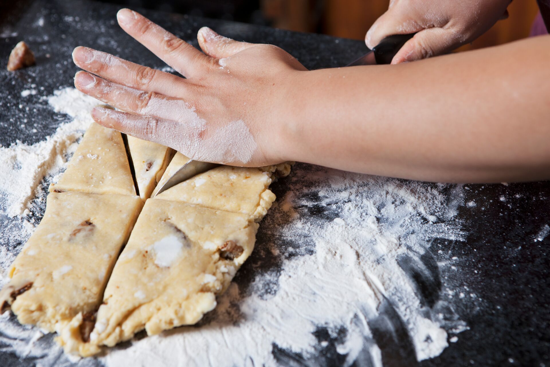 Hands on dough