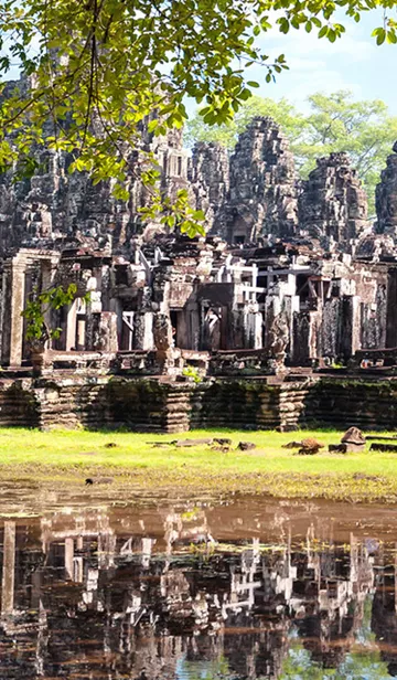 Monks in front of Angkor Wat temple, Cambodia.