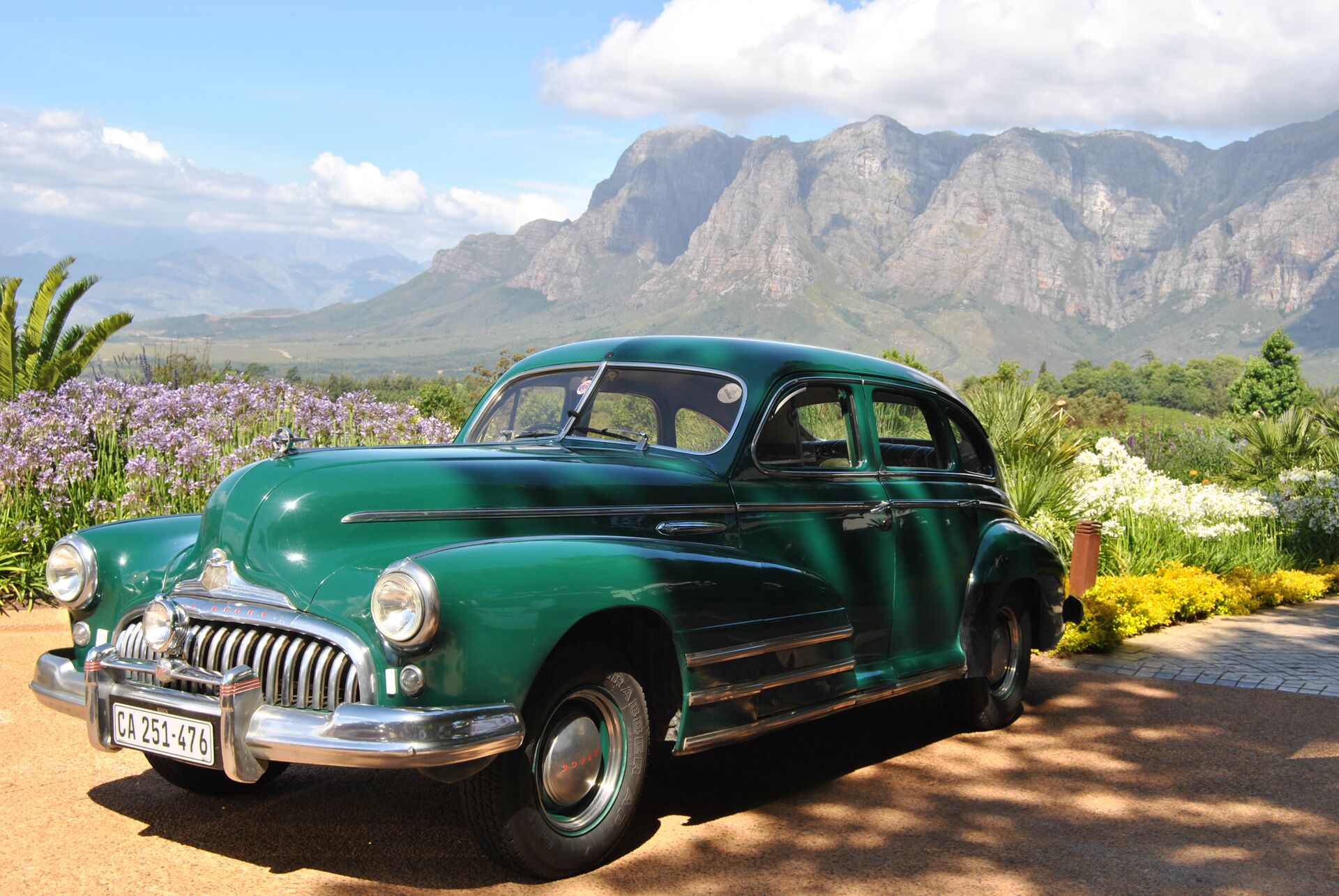 Vintage car parked in Stellenbosch vineyards, South Africa