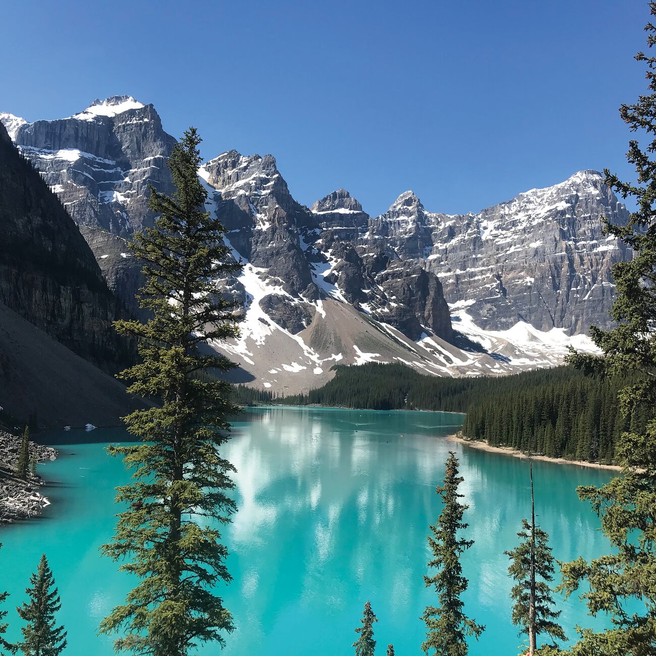 Landscape of mountains and lake in sunny day