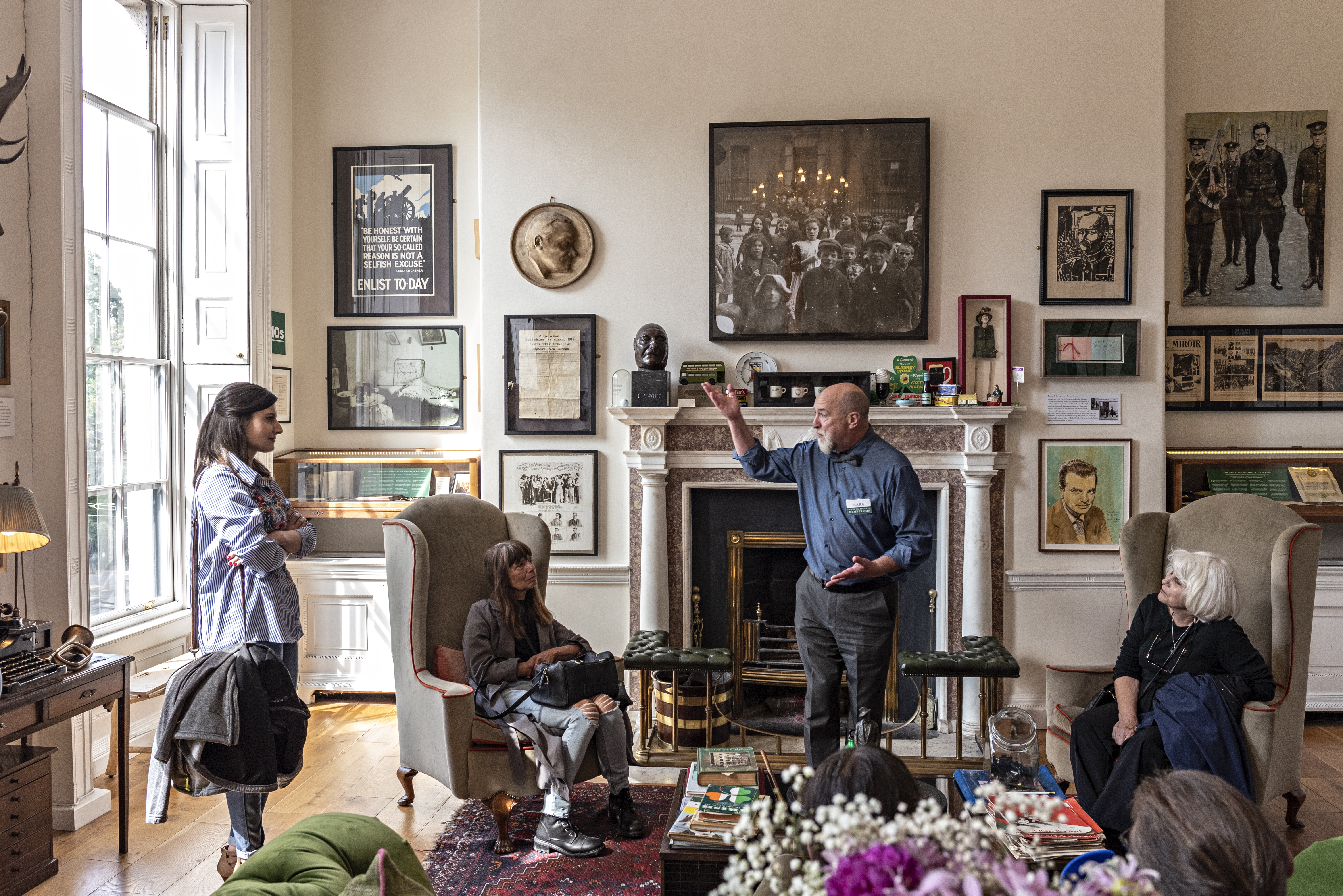 Man talking to people in a room