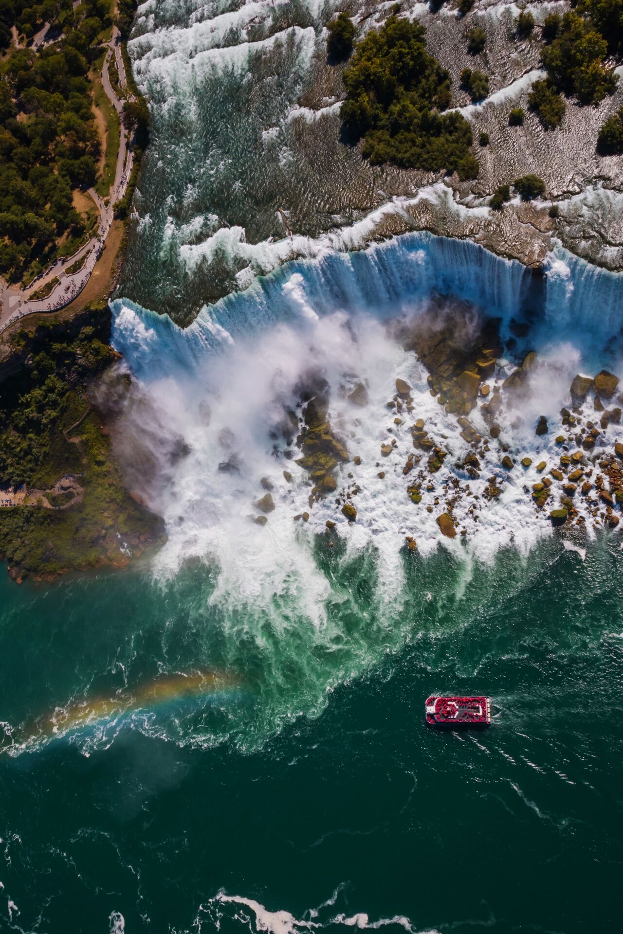 Overhead view of a boat at the foot of the Niagara Falls in Canada